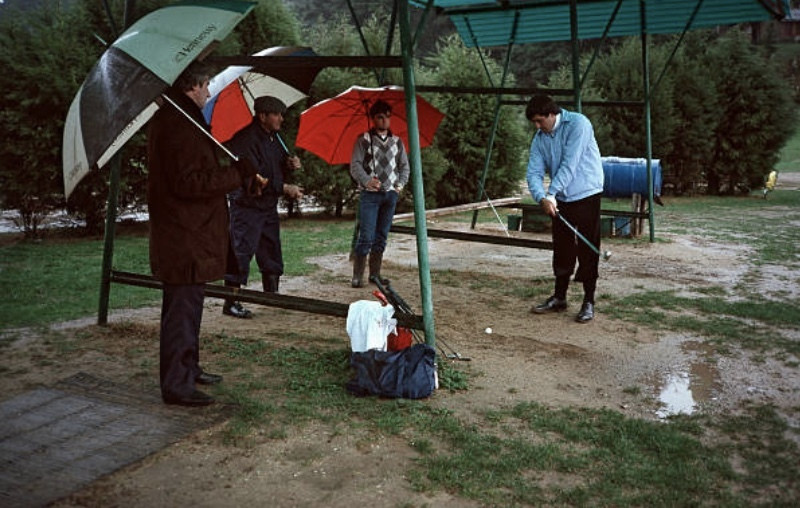 Seve Ballesteros working on his - digging it from the dirt